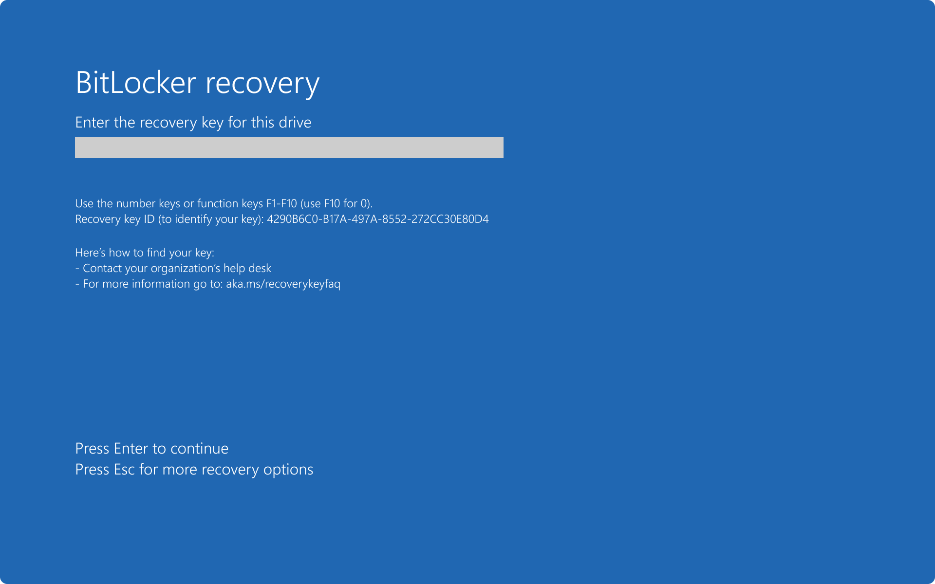 Blue BitLocker recovery screen showing the recovery key entry field and Recovery key ID