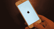 iPhone white screen with apple logo