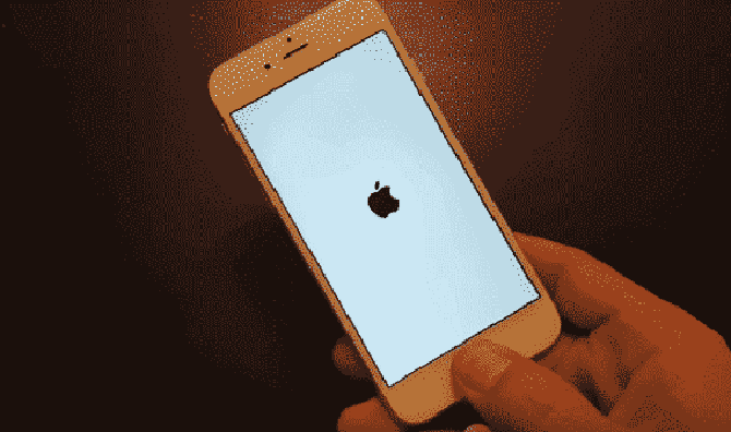 iPhone white screen with black apple logo