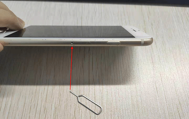 Take out your SIM tray